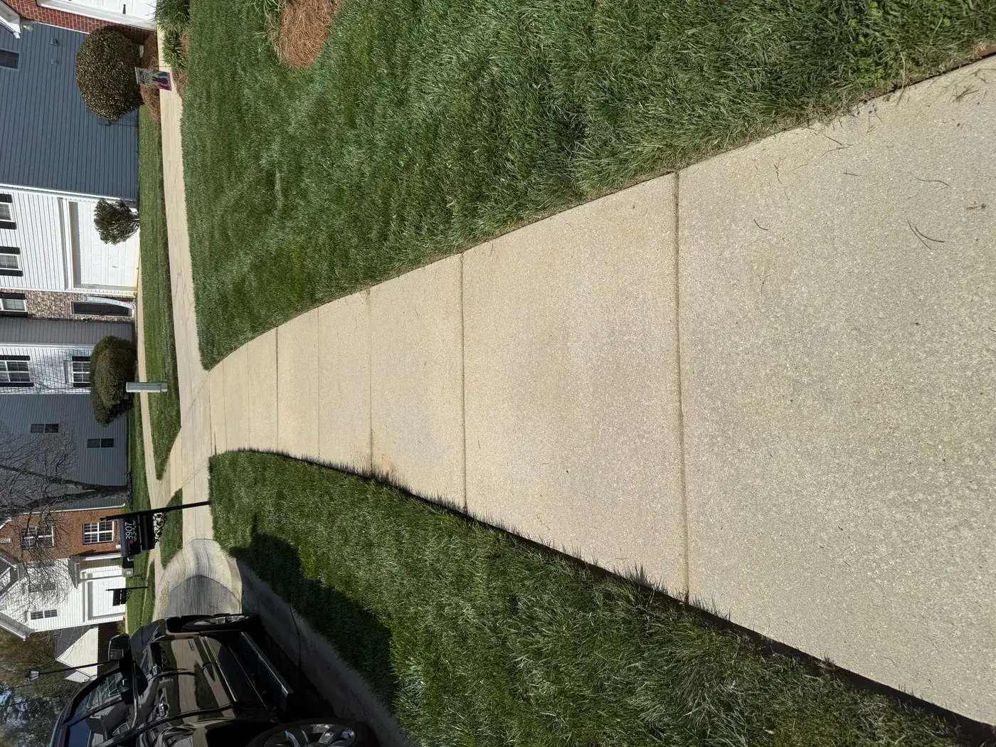 Clean concrete sidewalk after pressure washing Denver NC