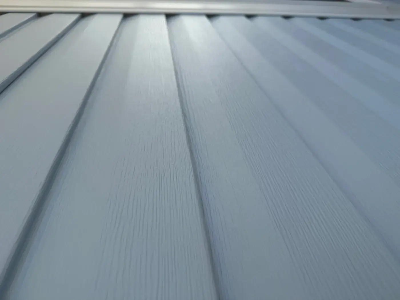 Clean vinyl siding after soft wash house washing