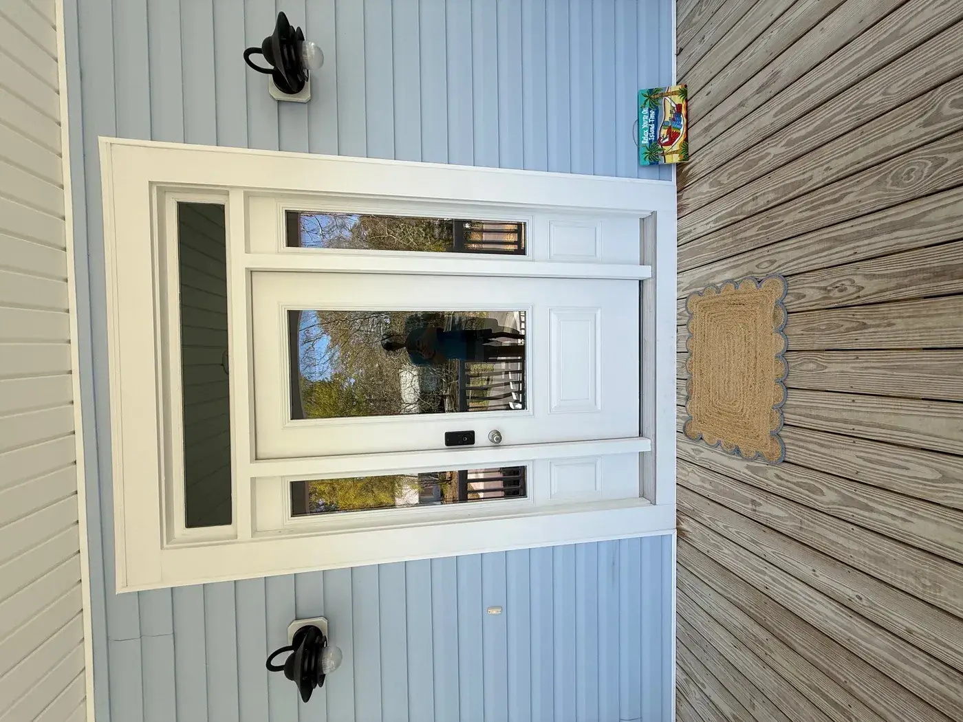 Clean home entry and siding after pressure washing