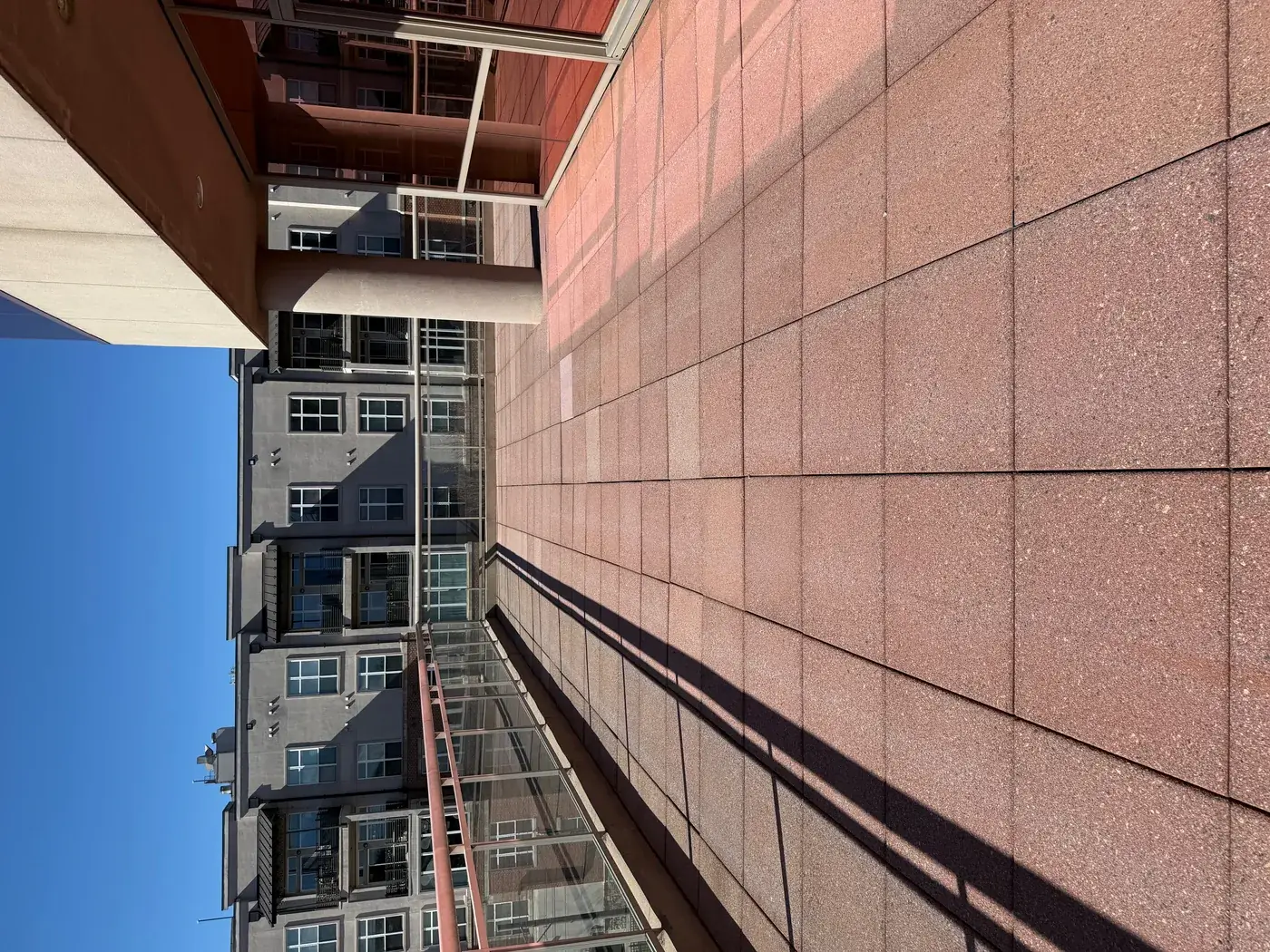 Clean commercial rooftop terrace after pressure washing
